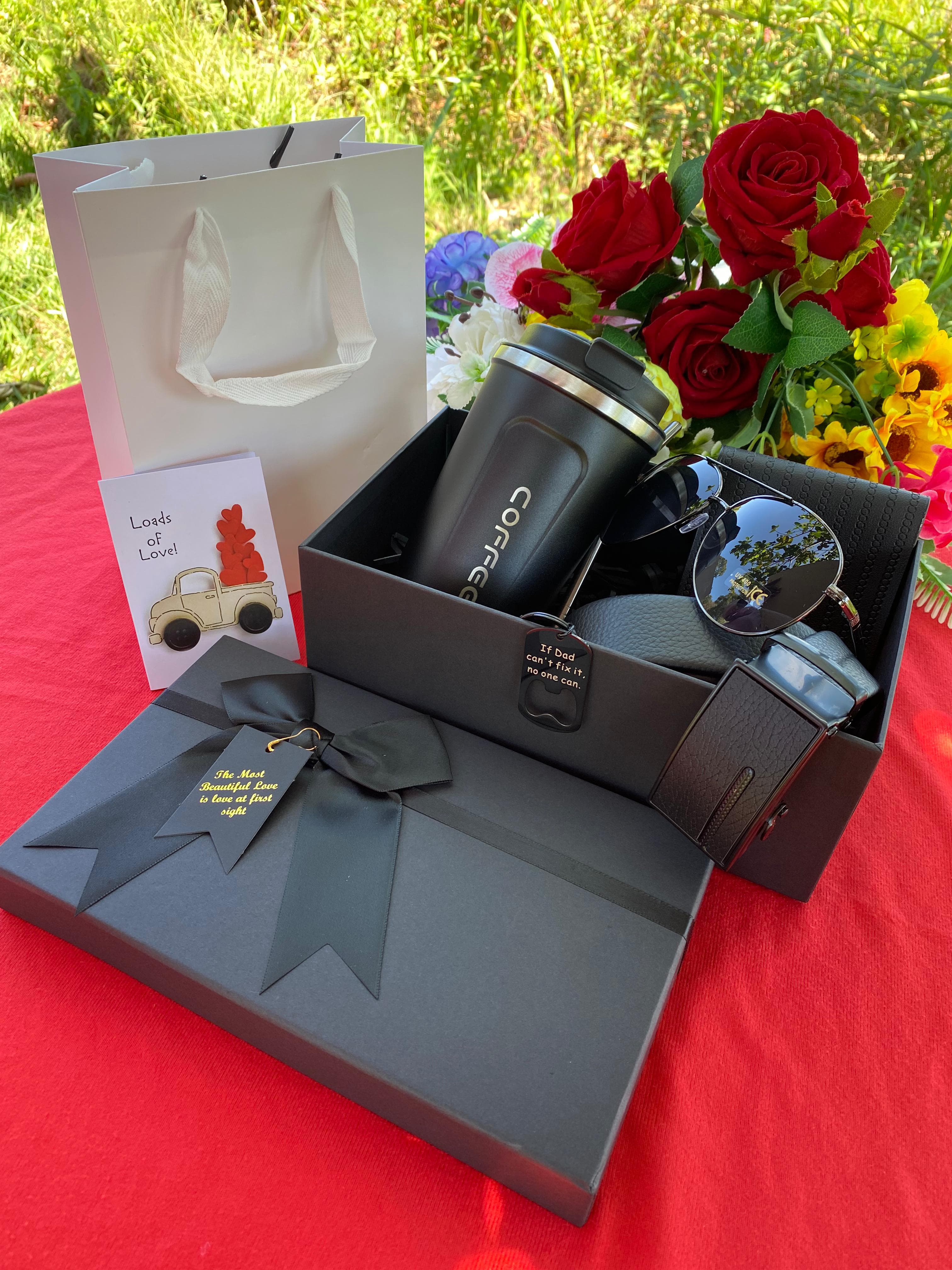 (EXPRESS LOVE DEMURELY)VALENTINES MEN GIFT PACK 
 Thermal coffee cup/mug  Scooping/Stirring spoon Sunglasses  Bottle opener/Key holder Wallet  Belt Gift card  Box & Bag