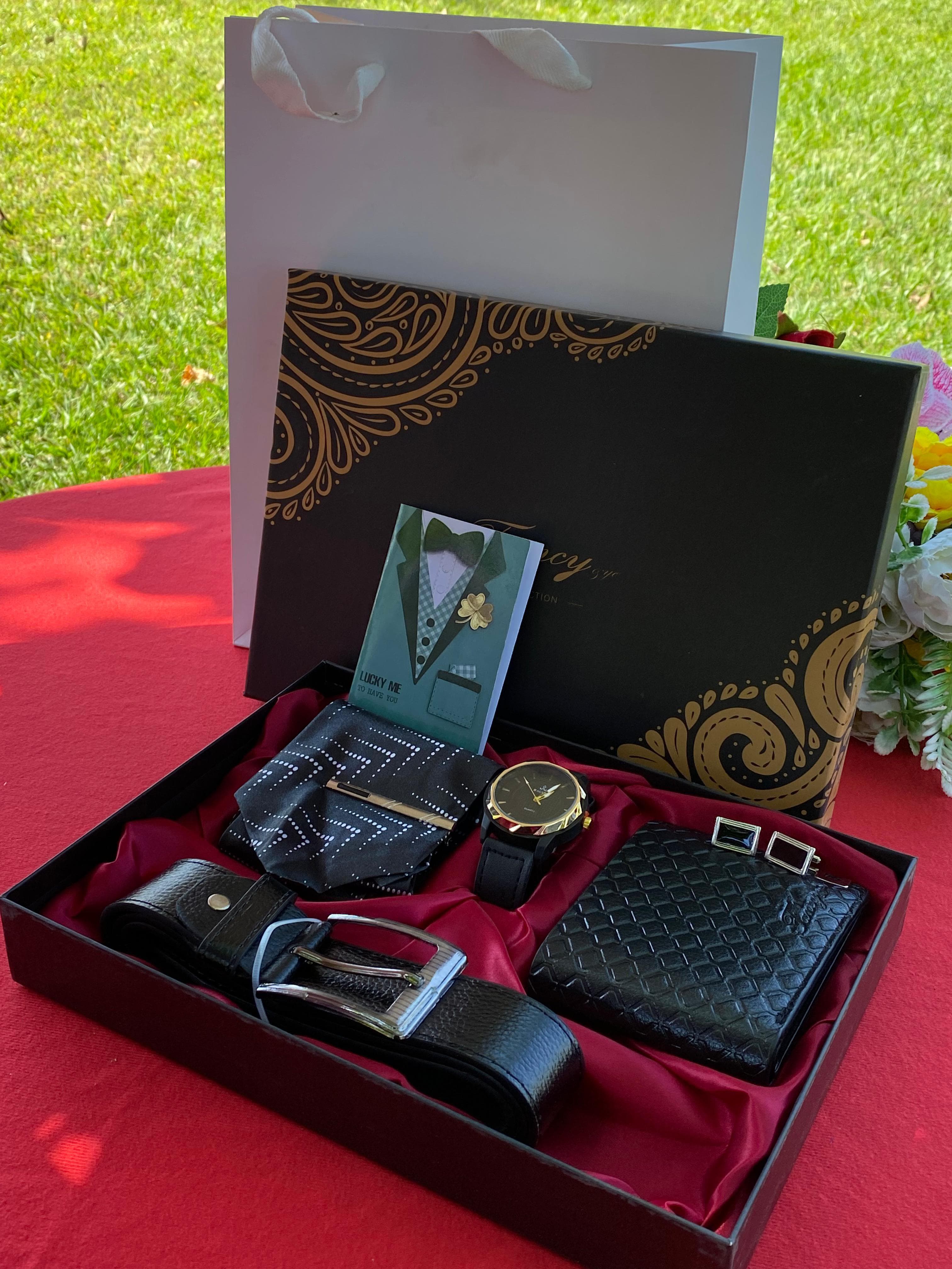 VALENTINES MEN GIFT PACK comprises of top notch quality to match a,Tie, Wallet,  Watch, Belt ,Shirt cufflinks, Gift card and a Box & Bag