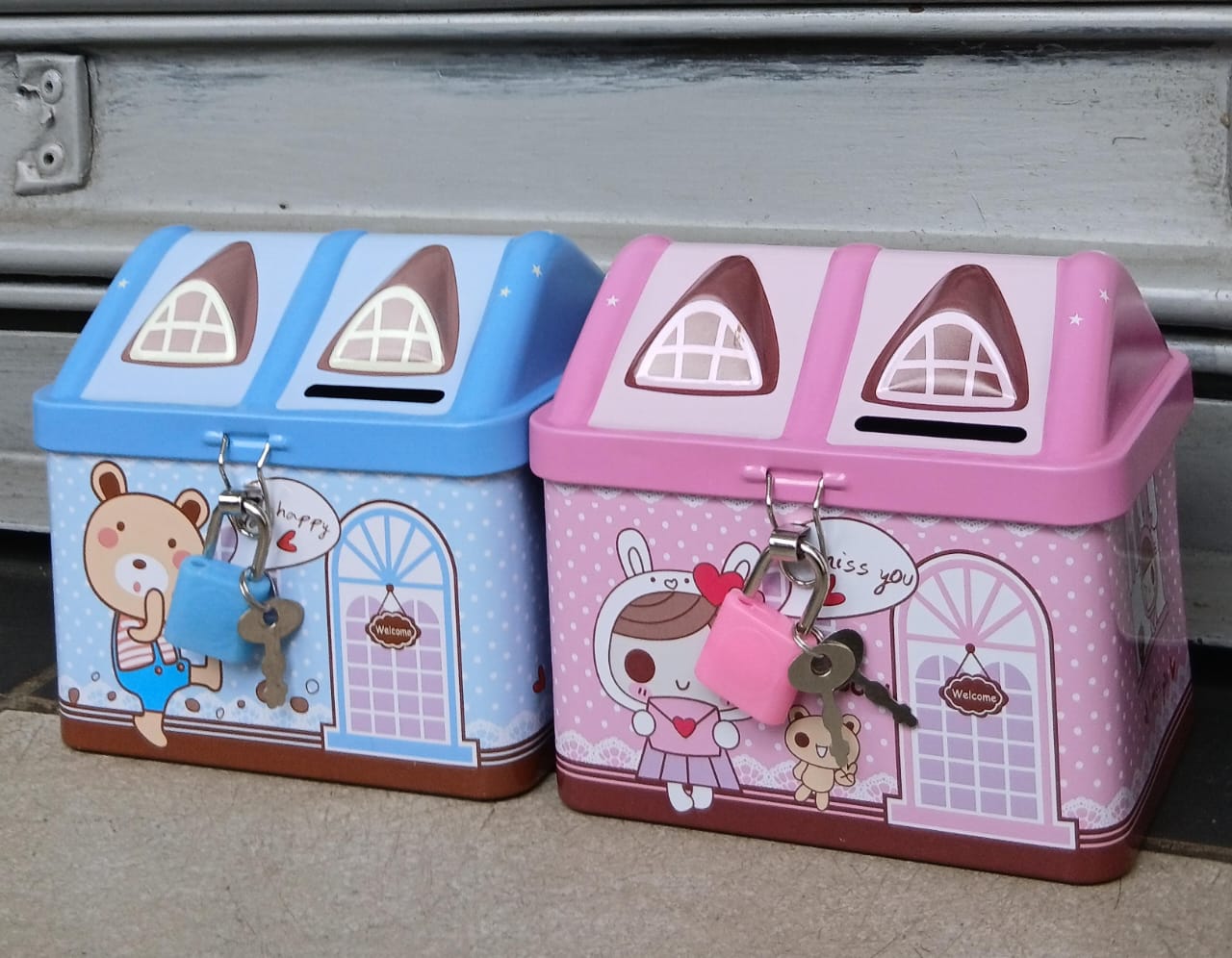 Teach the joy of saving____Metallic house bank.. Shaped like a cute little house, it’s not just a coin saver — it’s a stylish décor piece too! 🌟Made from high-quality metal for long-lasting use