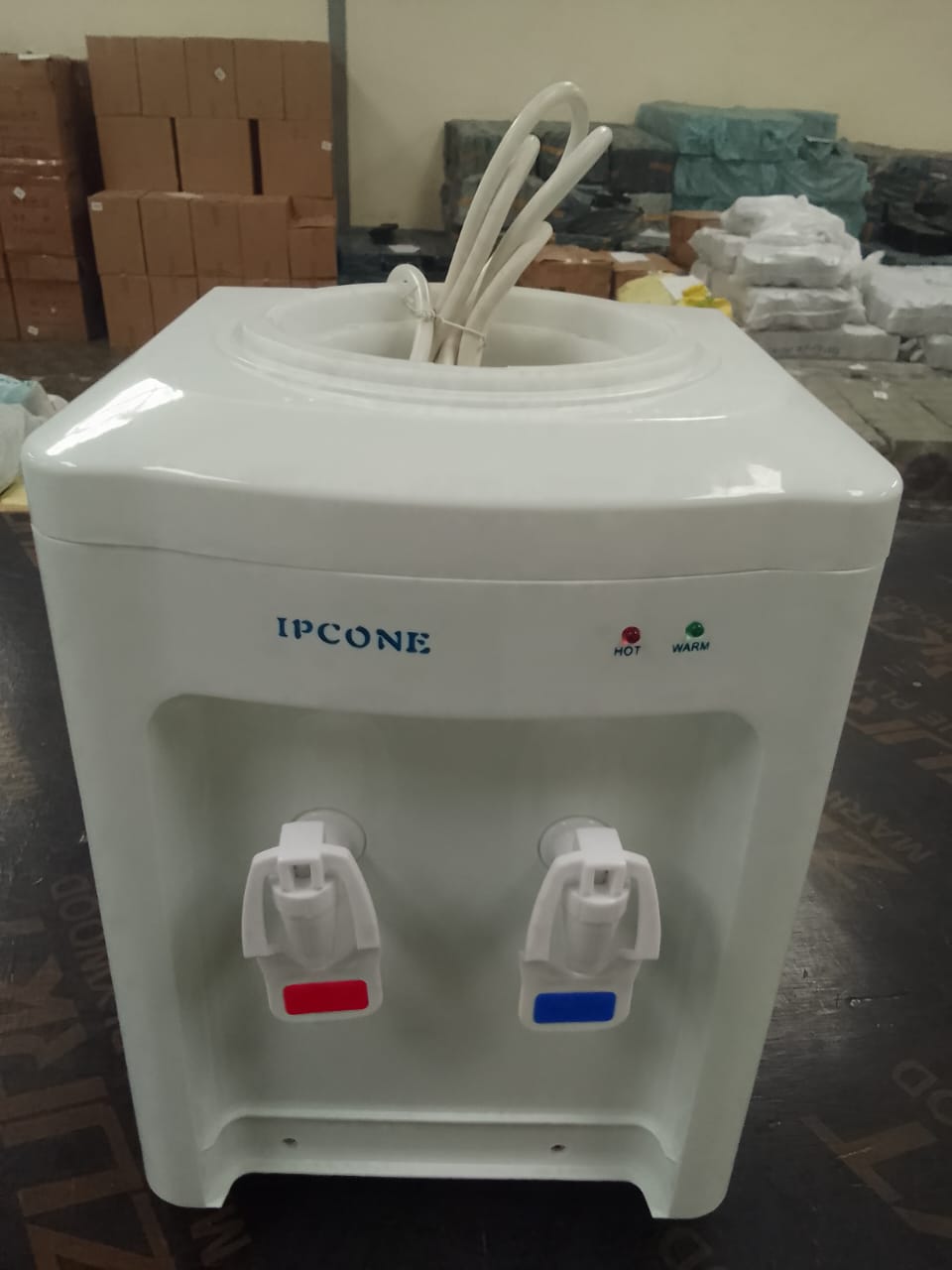 IPCONE Dispenser, Table Top Hot And Normal Water   This water dispenser is ideal for home, office or any outdoor environment as it is not only easy to use but also features a free-standing design for