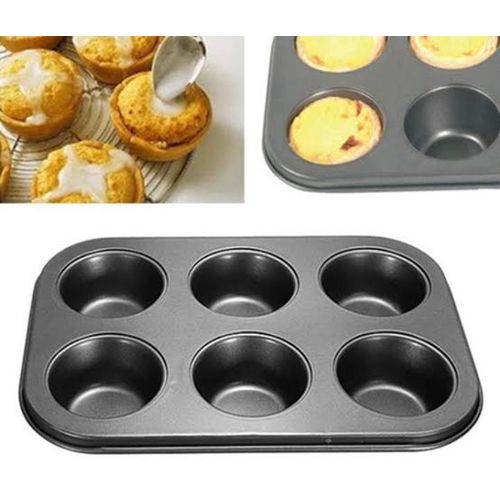 A Set Of 4 Different Shapes Of Baking Tin