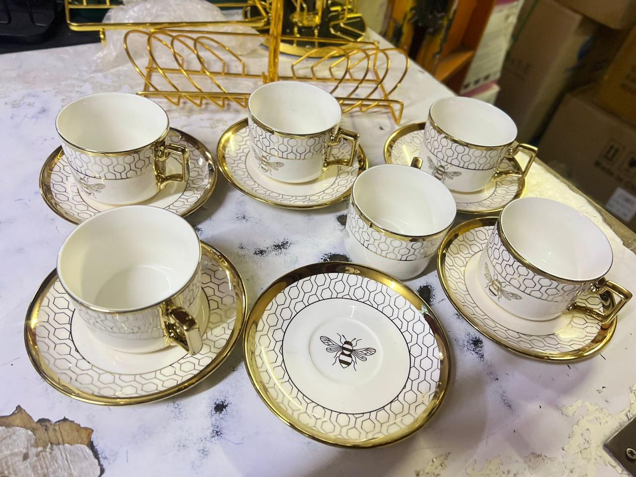 12 Pcs Classy Ceramic Cup & Saucer Set - Strong ceramic mugs
Made with thick comfortable grip ergonomic handles
Quality Chip resistant ceramic material.