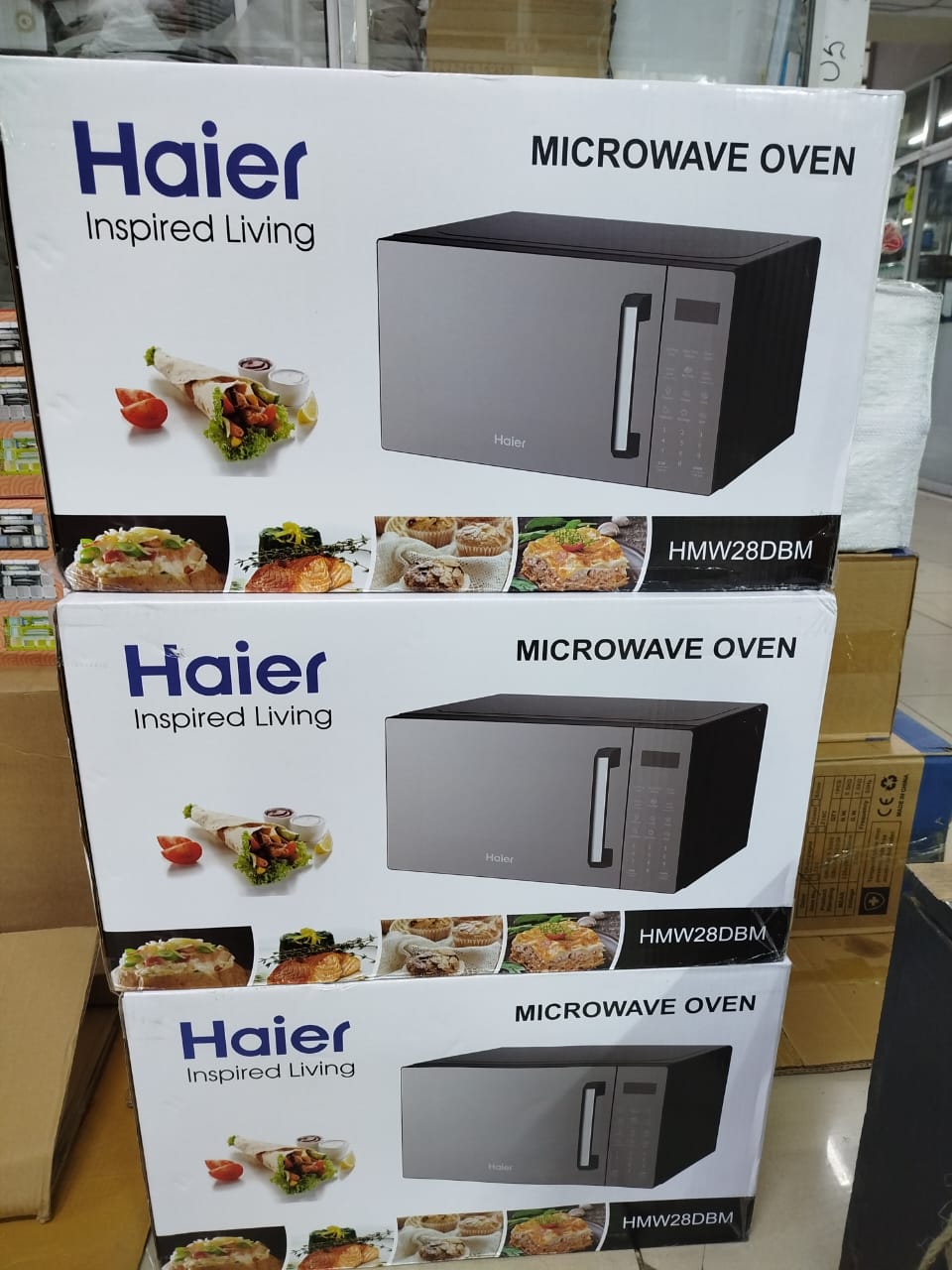 28 Litres Haier Digital Microwave Oven, Easy auto-cook functions: Popcorn, Potato, Pizza, Fish, Milk/Coffee, Rice, Spaghetti & Reheat.