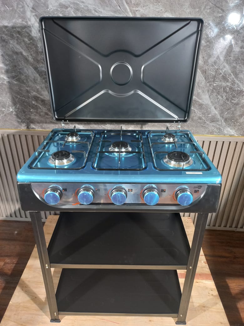 Starlux 5 Burner Standing Cooker With Shelves, Featuring five powerful burners, a strong stainless steel frame, dual black steel shelves for storage, and easy-to-clean surfaces.