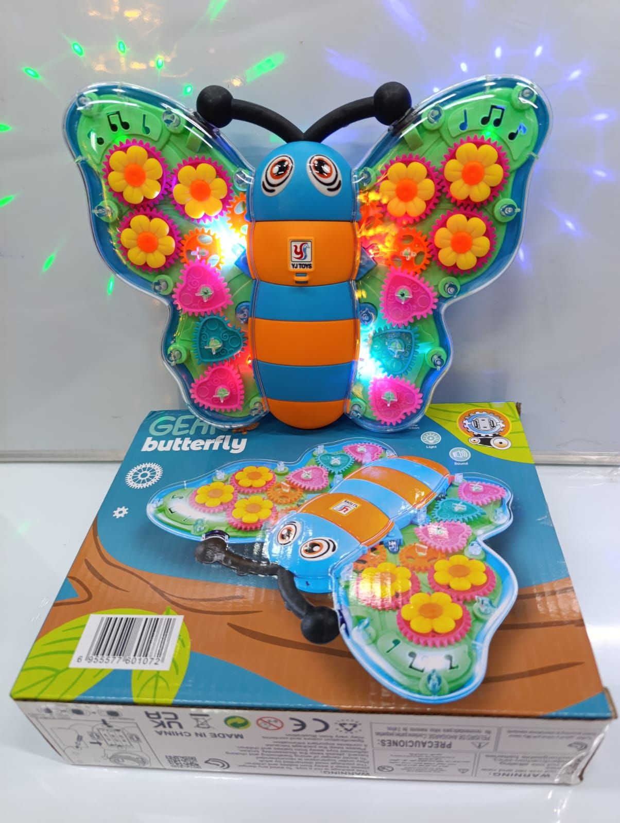 BUTTERFLY TOY. Battery-Operated Gear Butterfly, gives a wonderful glow that leaves your kids fascinated, can be placed on a table or hanged on a wall.