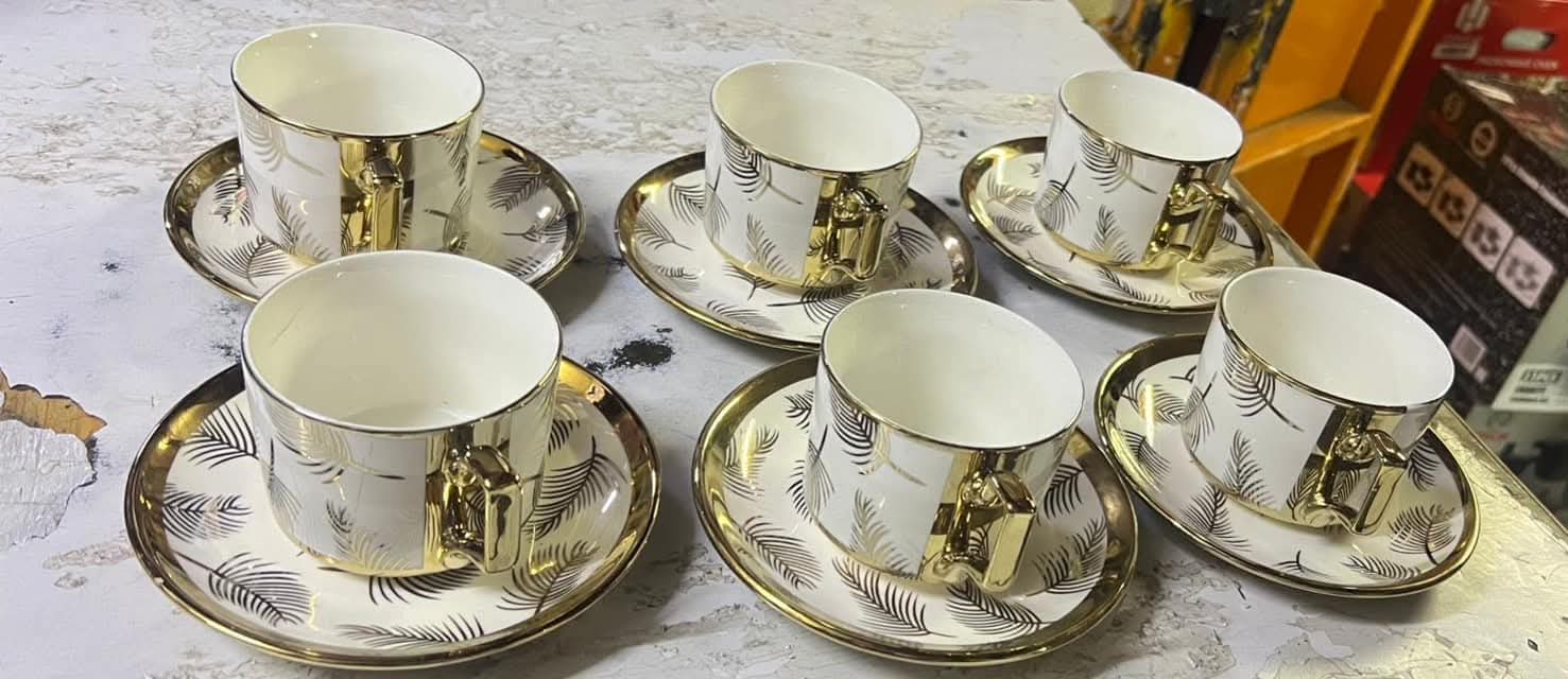 6-Piece Ceramic Cup & Saucer Set (White & Gold) - Classic ceramic with a stylish gold trim, Durable, chip-resistant, and easy to clean, Ideal for daily use or special occasions.