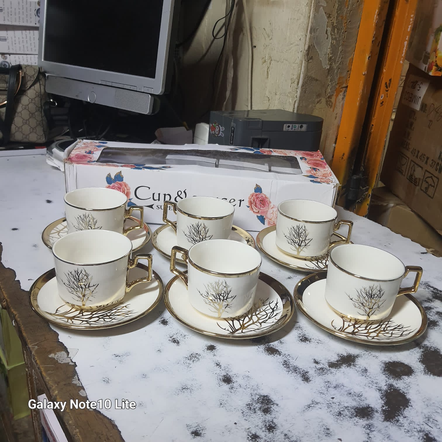 6-Piece Ceramic Cup & Saucer Set (White & Gold) - Classic ceramic with a stylish gold trim, Durable, chip-resistant, and easy to clean, Ideal for daily use or special occasions.