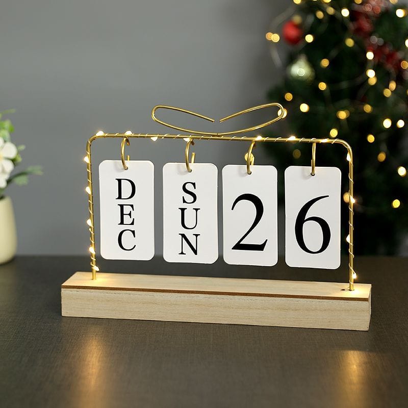 Metallic desktop home/office calendar with light...Uses 2 AA batteries to light[not included]