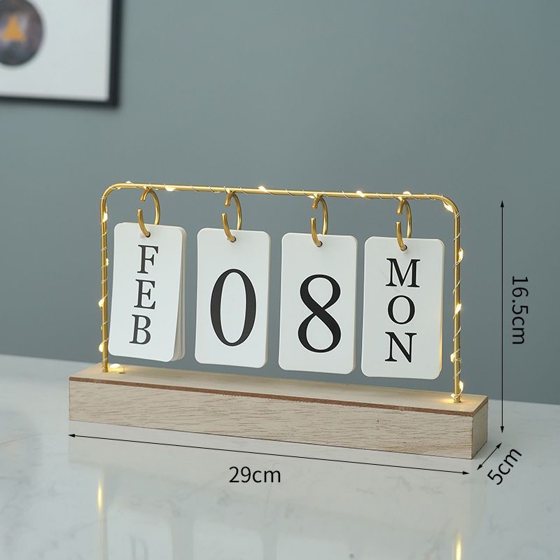 Metallic desktop home/office calendar with light...Uses 2 AA batteries to light[not included]