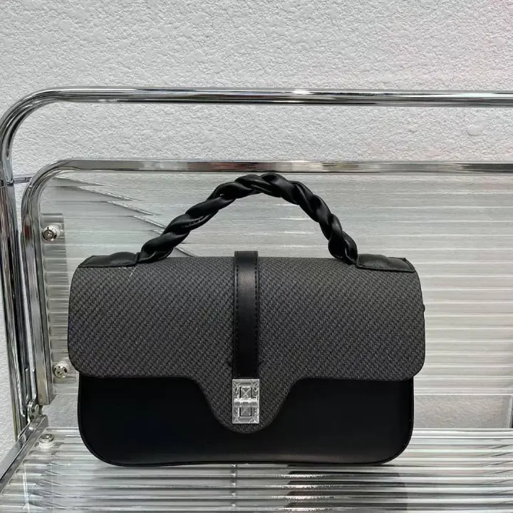 STYLISH LADIES SLING BAG. Chic, modern, and impossible to ignore.It has a compact, rectangular silhouette with softly rounded corners.