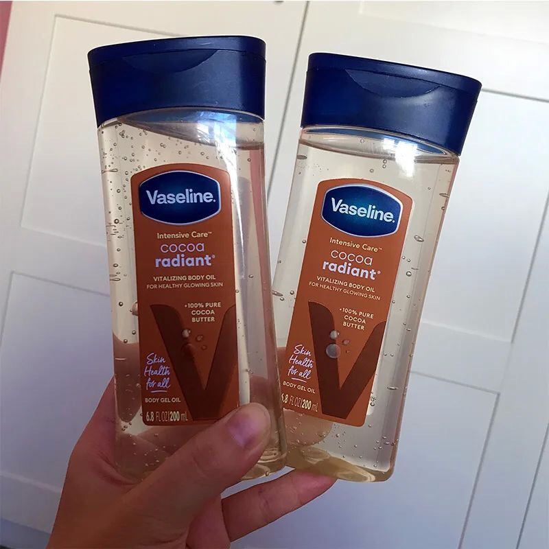 Vaseline Cocoa Radiant Body Oil With Pure Cocoa Butter - ade with 100% Pure Cocoa Butter + Replenishing Oils