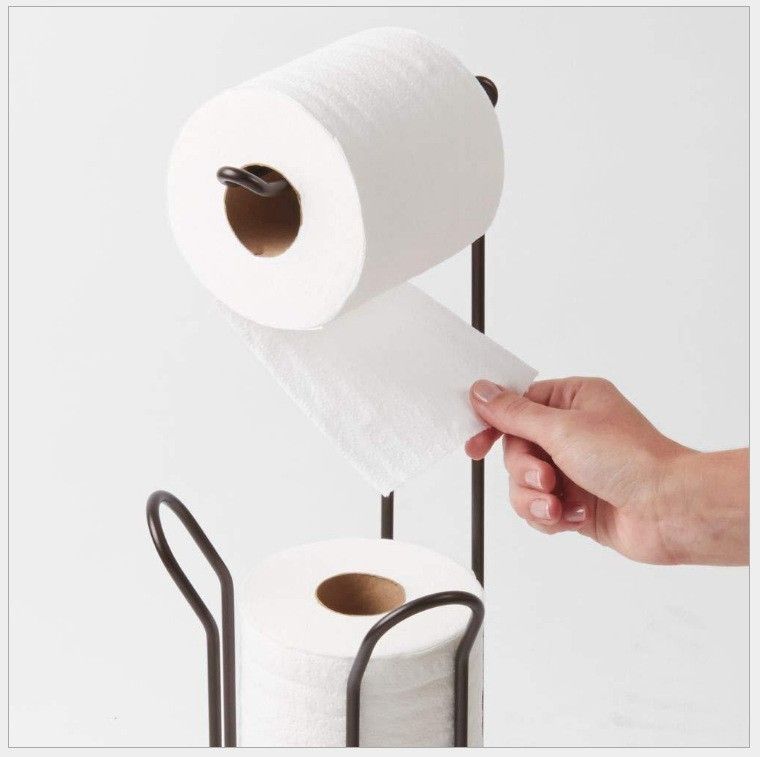 Stainless Steel Free-Standing Tissue Holder – Vertical Toilet Paper Storage Rack for Modern Bathroom Organization.