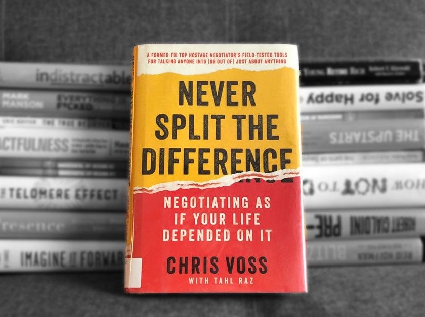 Never Split the Difference: Negotiating As If Your Life Depended On It Book by Christopher Voss and Tahl Raz