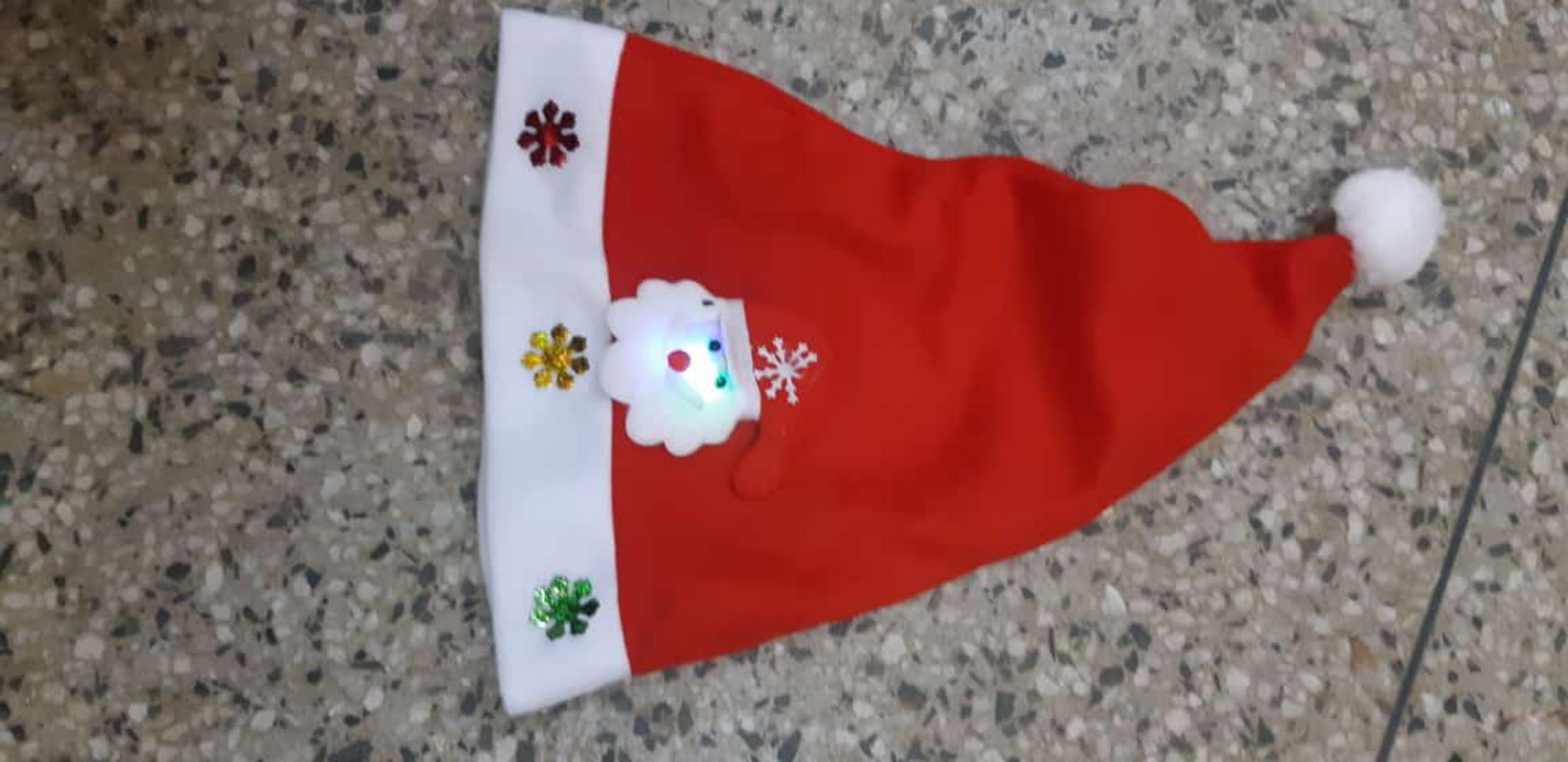 Light-Up Santa Hat with Sparkling Snowflake Decor - Perfect for Christmas!