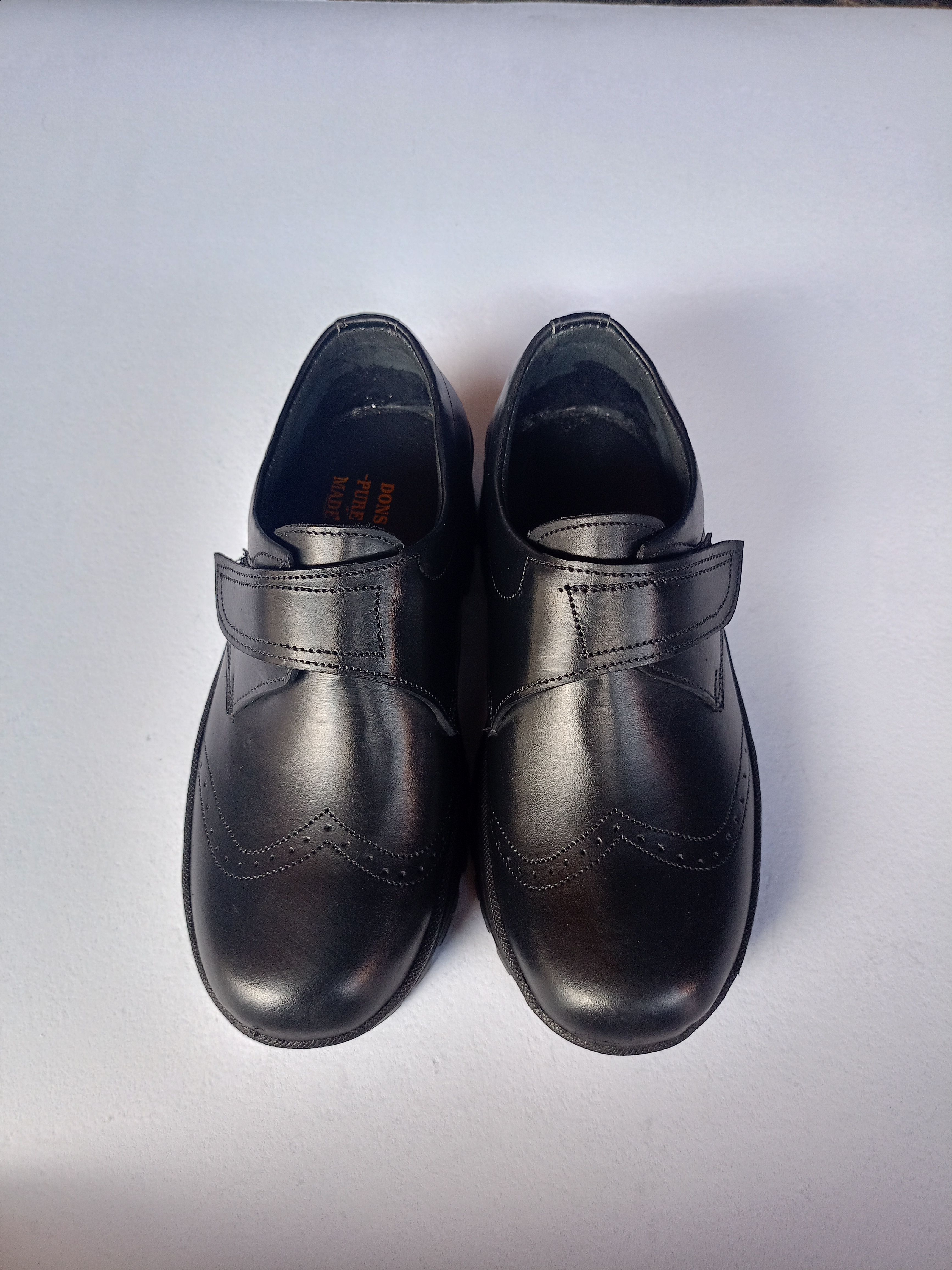 Back to School Kids Black Genuine Leather Shoes with New Design and Vecro Design for Closure,  For both Boys and Girls
Comfortable Durable and Long Lasting School Shoes available in all Sizes