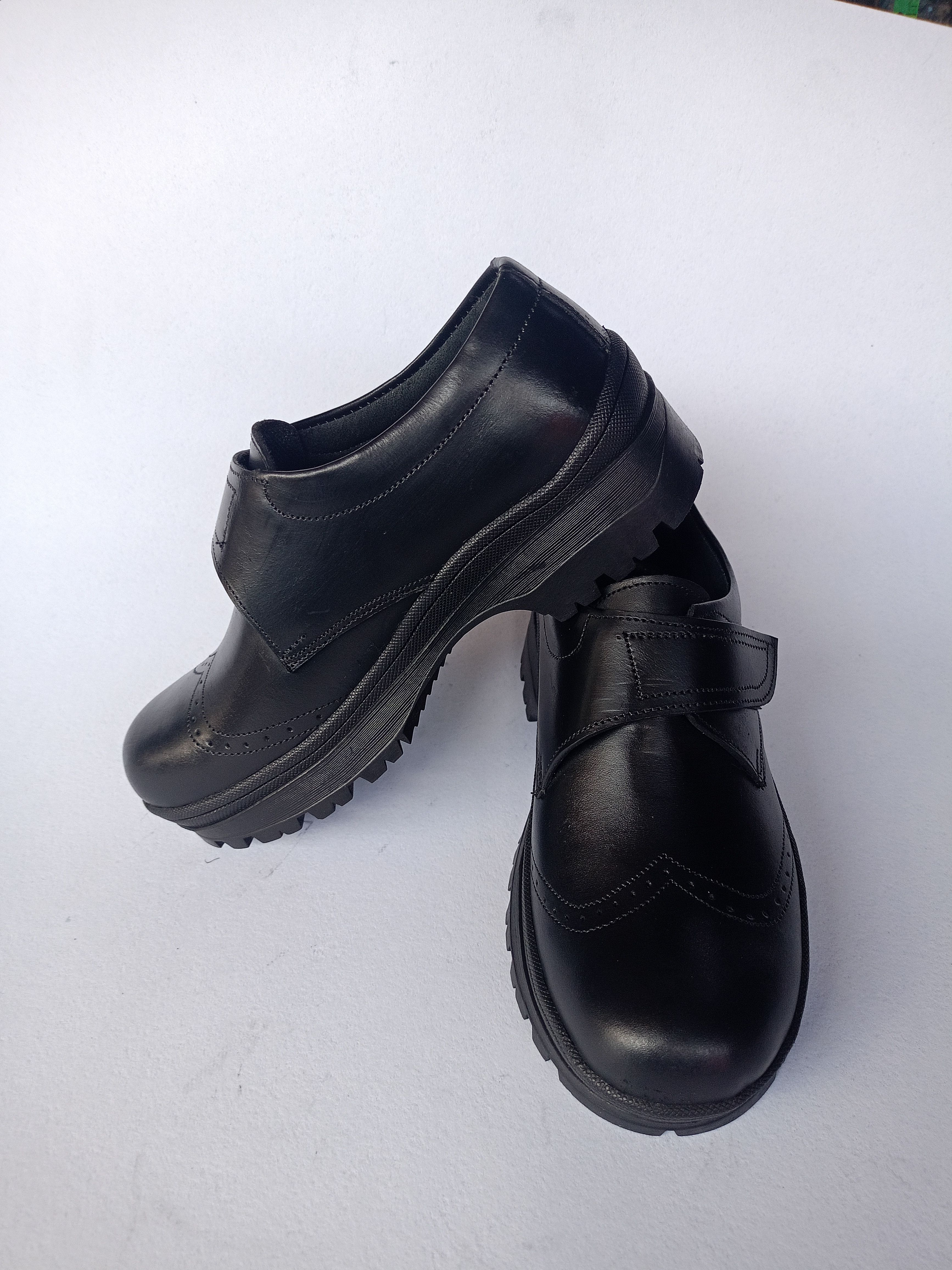 Back to School Kids Black Genuine Leather Shoes with New Design and Vecro Design for Closure,  For both Boys and Girls
Comfortable Durable and Long Lasting School Shoes available in all Sizes