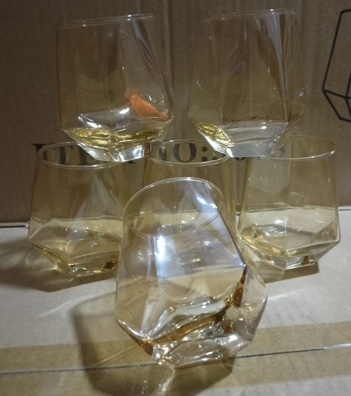 Golden whisky glass, In diamond shape, Made of clear,simple yet classy design, Great durability with weighted base, Made of lead free material, Easy hand wash and machine wash, Affordable