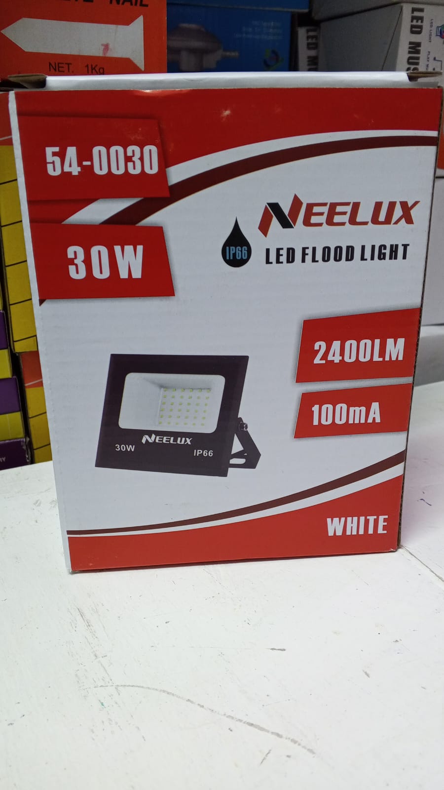 Neelux 30W LED Flood Light. 
Power: 30 watts
Brightness: 2400 lumens
Ingress Protection (IP) Rating: IP66, signifying it is weatherproof and suitable for outdoor conditions
Color: White
Current: 100mA