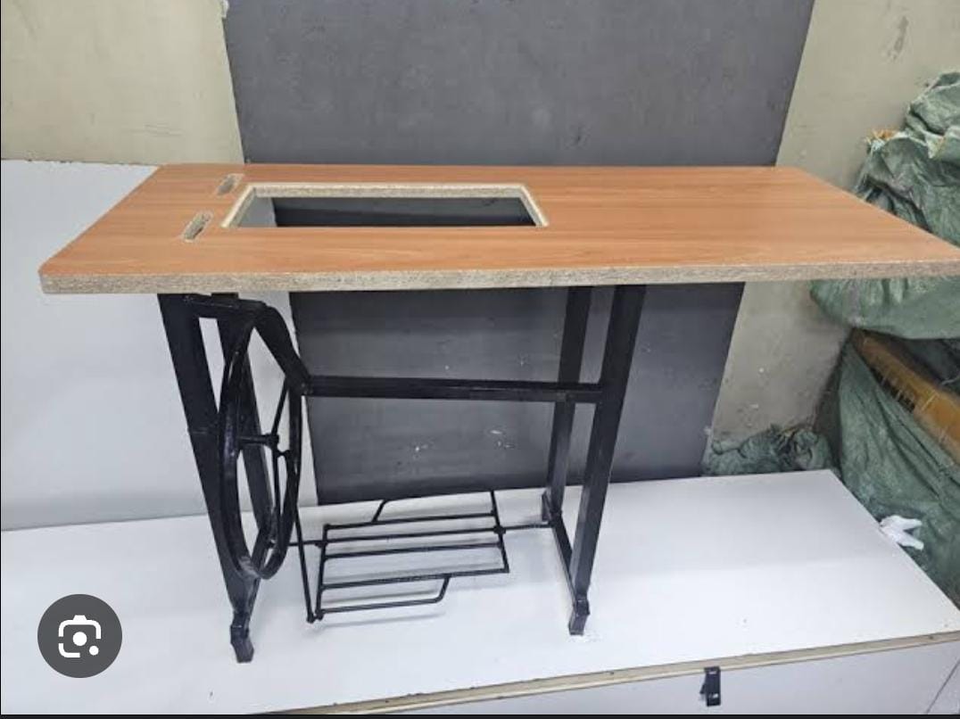 Sewing Machine Table & Stand (Treadle Type)
This sewing machine table and stand is a classic, heavy-duty setup designed to support traditional household and tailoring sewing machines. Crafted from hig