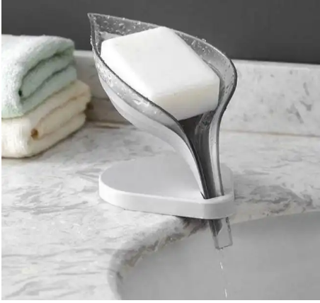 Leaf Shaped Soap Holder Sticks with Sanction-The Leaf Shaped Soap Holder combines functionality with a charming design, featuring a leaf motif that adds a touch of nature to your bathroom or kitchen.
