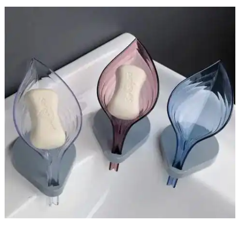 Leaf Shaped Soap Holder Sticks with Sanction-The Leaf Shaped Soap Holder combines functionality with a charming design, featuring a leaf motif that adds a touch of nature to your bathroom or kitchen.