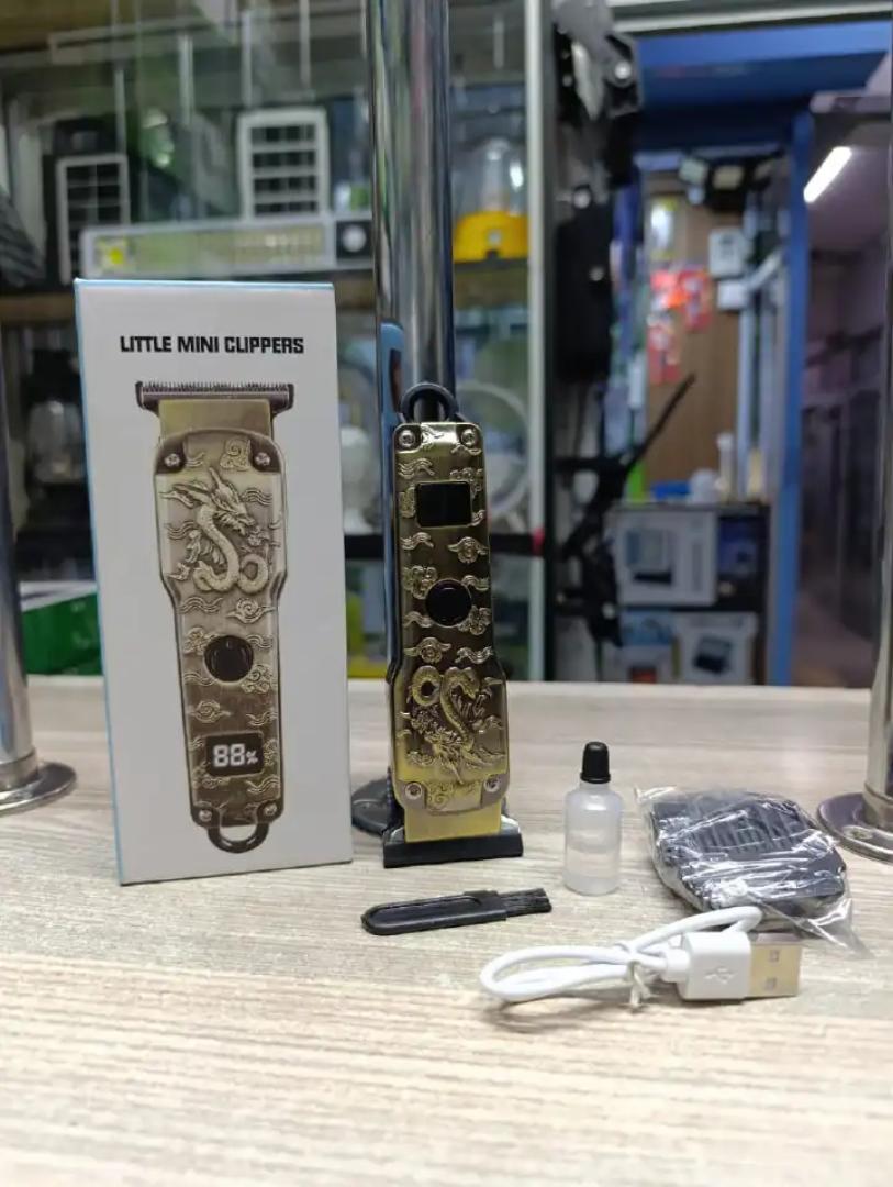 PRICE DROP !! Reliable Quality Rechargeable Dragon Professional Electric Hair Trimmer Clipper Kinyozi. It allows you to create multiple styles with just one machine, from trimming to hair extensions.