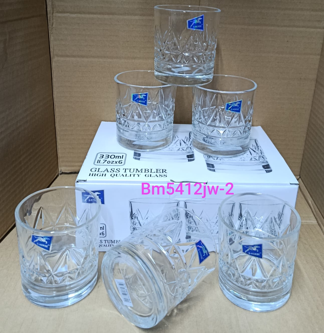 six glass tumblers, often used for serving beverages like whiskey, juice, or water.
Product: Set of 6 glass tumblers. 
Capacity: 330 ml (11.7 oz) per glass. 
Material: The glasses are made of clear, h