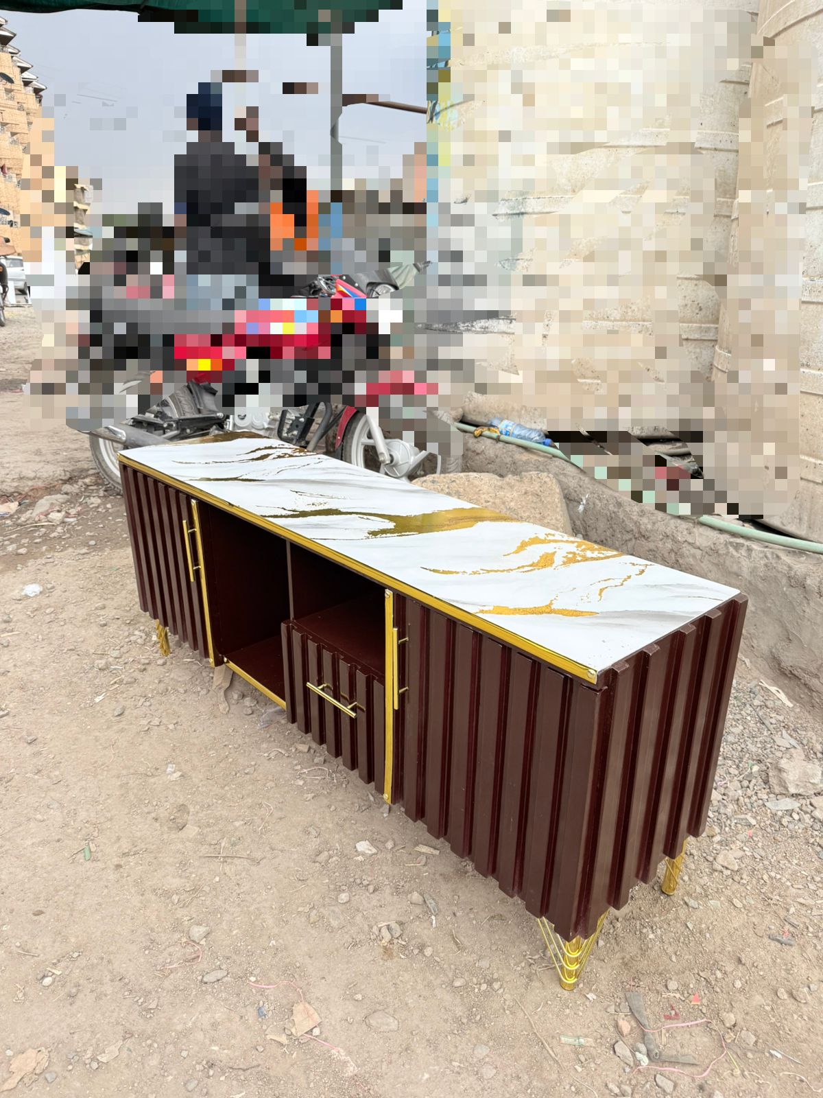 Executive Chocolate TV Stand with Marble Sheet Top

Elevate your living space with this Executive Chocolate TV Stand, where luxury meets functionality. Crafted from high-quality engineered wood, it fe