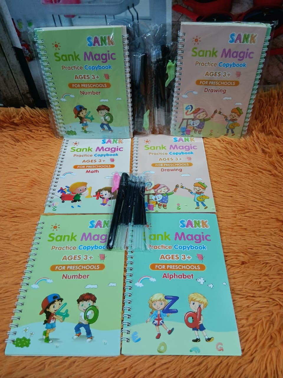 BEST DEALS FOR KIDS🤑🤑Magic Book 4in1 Sank Magic Reusable Practice Books.The sank magic book is a practice copy book which is reusable,  that comes in a set of 4 books I e. Numbers, Alphabet, Drawing