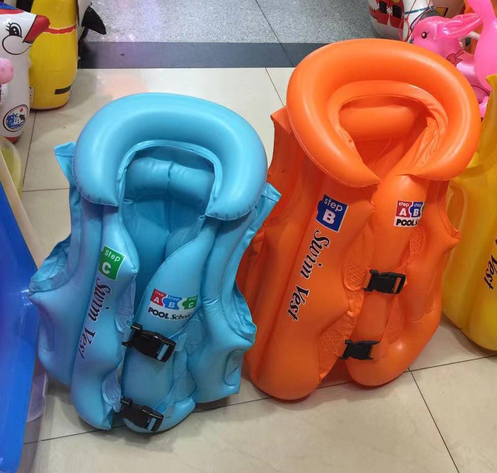 Small swimming jackets or floaters. designed to be a flotation aid to help children stay afloat and build confidence while learning to swim. 
Key features of these swim vests include:
Inflatable de