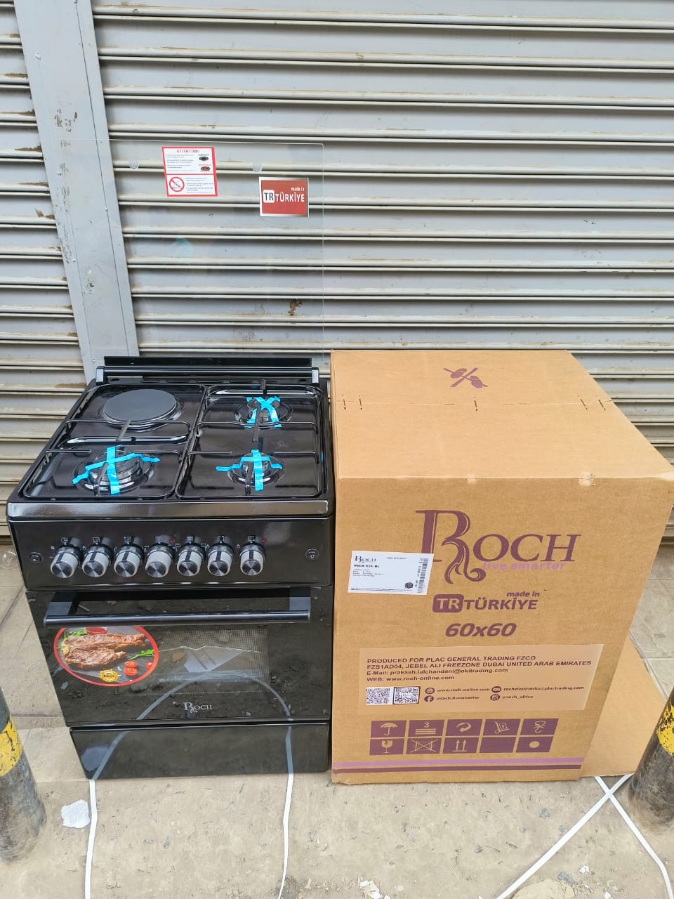 Roch 60x60 standing cooker.
Features: It is a 60x60 cm black standing cooker with 3 gas burners, 1 electric hotplate, and an electric oven with a grill function. 
Safety: The cooker includes flame fai