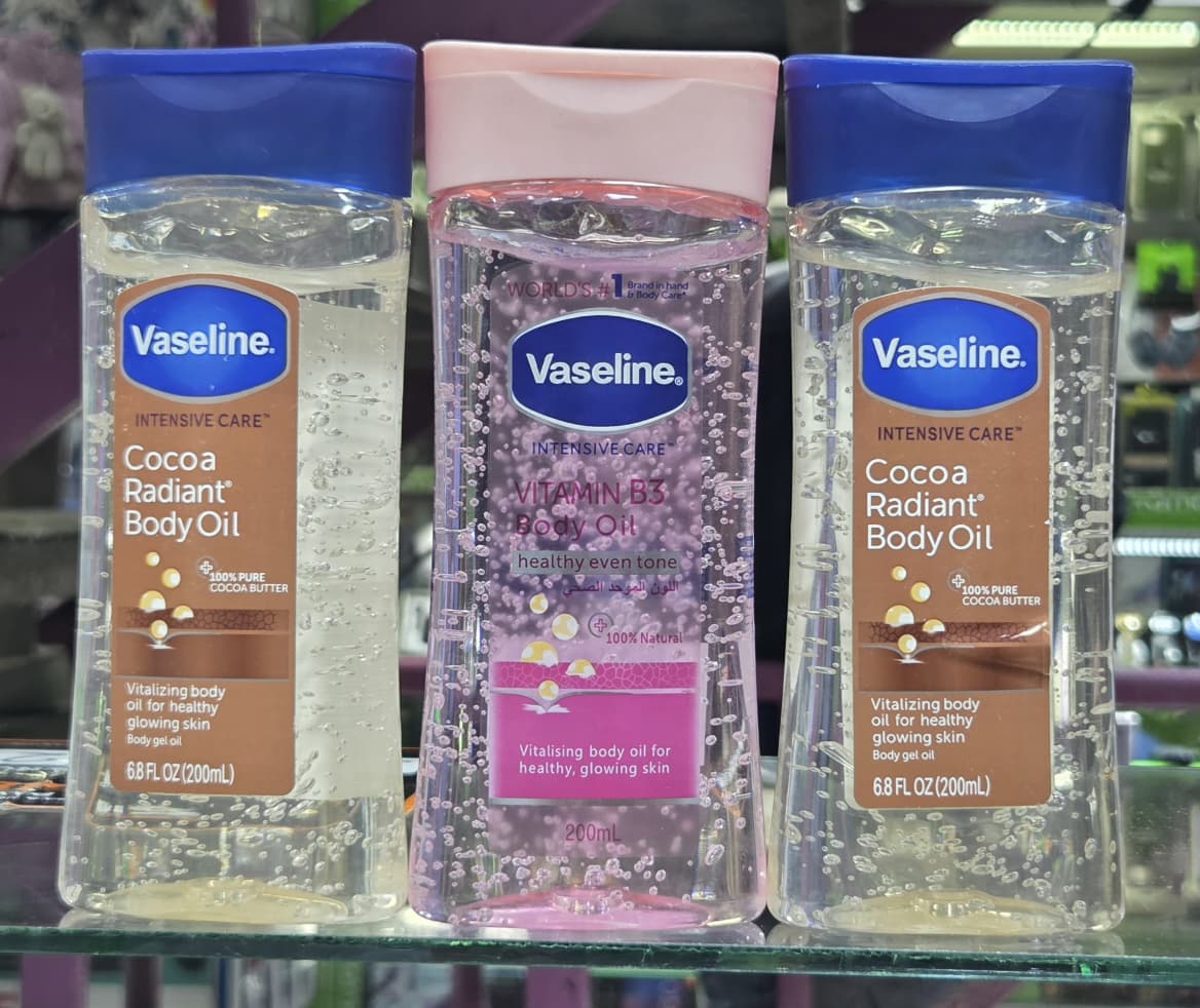 Vaseline Intensive Care Cocoa Radiant Body Oil and Vaseline Intensive Care Vitamin B3 Healthy Even Tone Body Oil — two luxurious body oils designed to leave your skin soft, luminous, and beautifully c