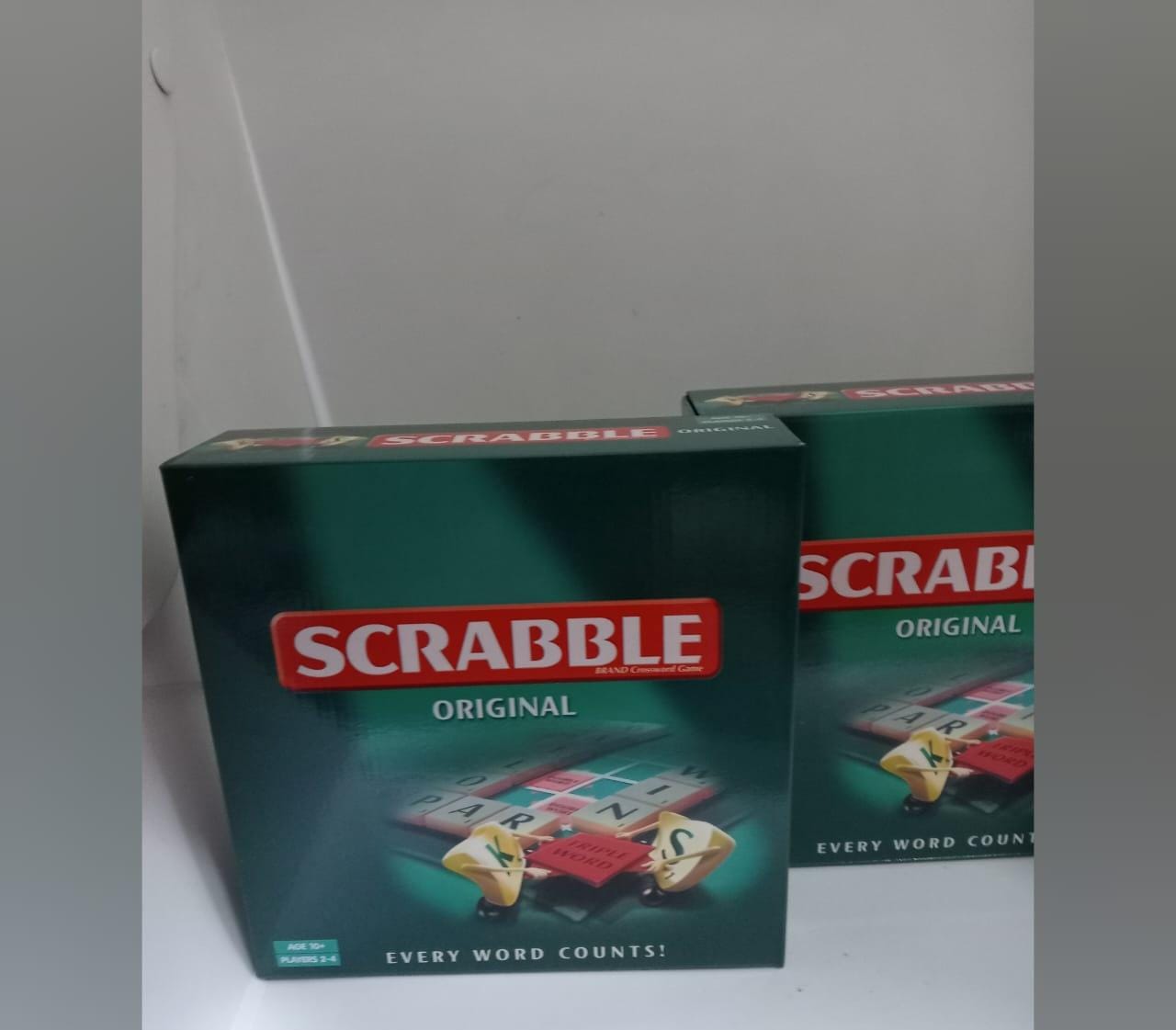 board game Scrabble.
Scrabble is a classic word game played by 2 to 4 players. The objective is to score points by forming words on the game board using letter tiles. Each letter tile has a different