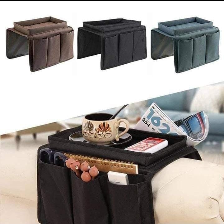 SOFA ARM ORGANIZER. Sofa arm organiser.  Easy to clean up and washable. With metal clamp on underside to clasp onto sofa armrest,Stores and organizes TV remote controls in one convenient location.