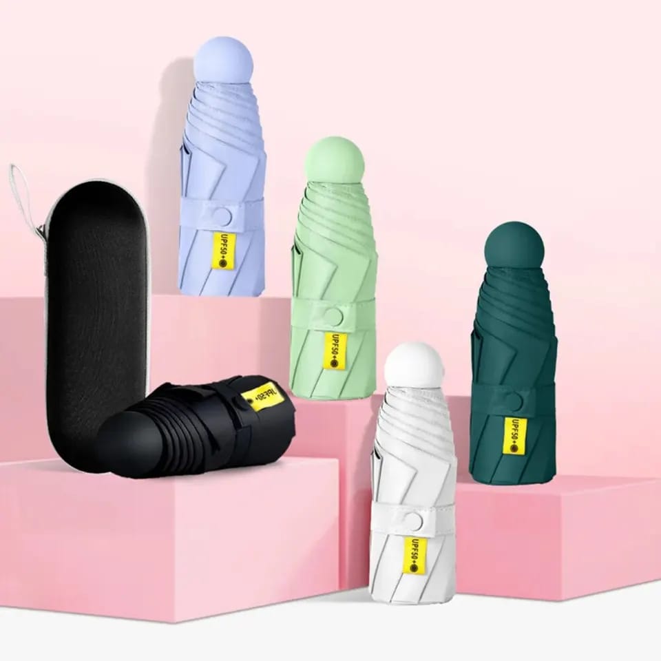 UMBRELLA. Nordic  capsule umbrella, the sun protection is stronger, and the arms are not tanned. The compact size when folded makes it easy to fit in a pocket or bag.