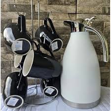 📍LATES OFFER📍🤑DONT MISS OUT 🤑LUXURIOUS Tea set Black flask,6black cups :high quality ceramic.This Combo has 2l Unbreakable Thermos and 6 Mugs. This flask has been crafted out of stainless steel to