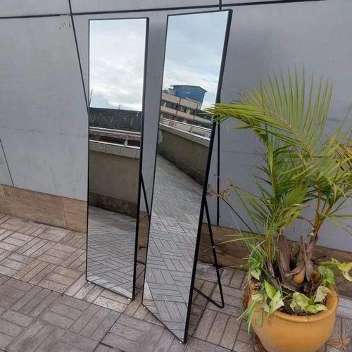 Black Full Length Stand Alone Dressing Mirror with Metallic Frame.Functional mirror
Elegant piece of decor
Long and steady mirror
Versatile in placement
Decorative accent
Aesthetically appealing
Gives