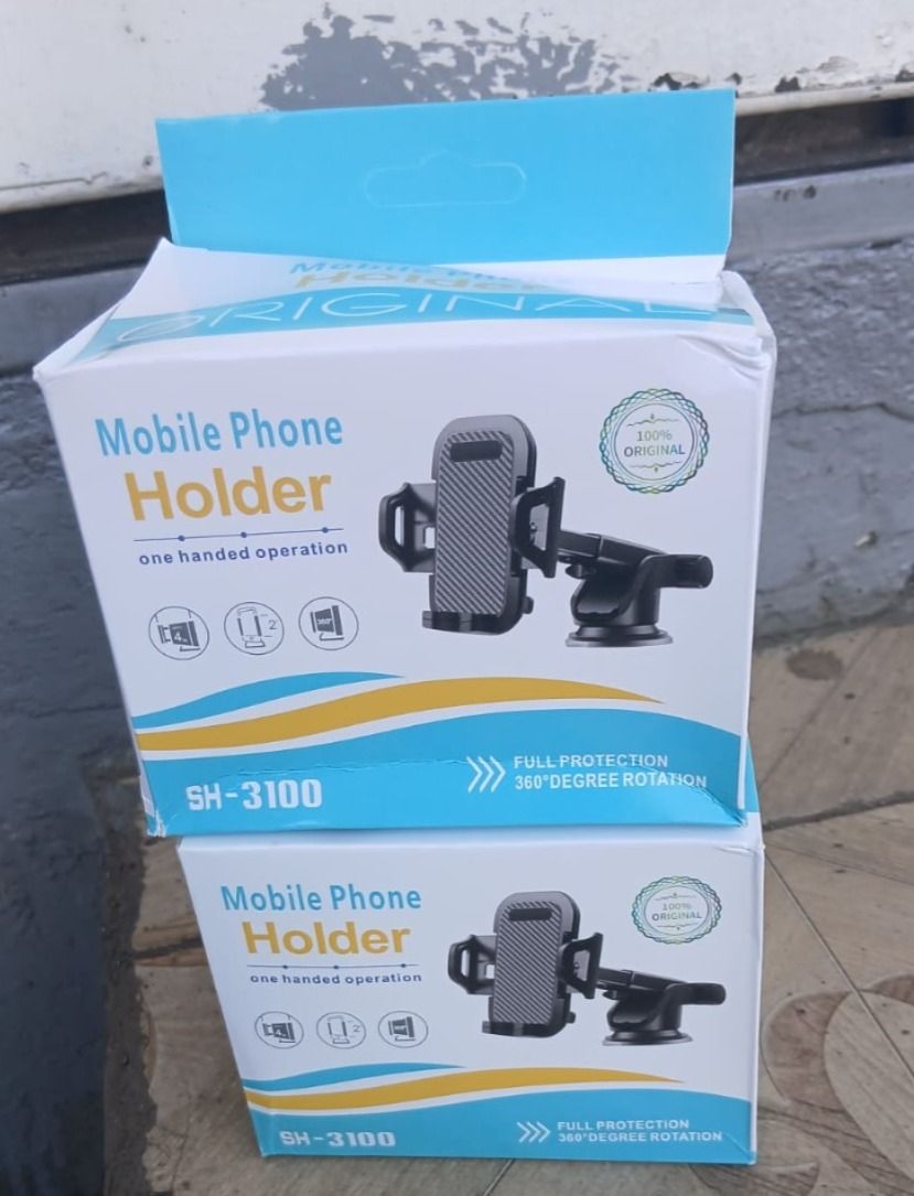 Universal Adjustable Car Phone Holder. Equipped with high-grade silicone pads and a strong clamp system, the SH-3100 keeps your phone tightly in place—even during sudden stops, sharp turns.