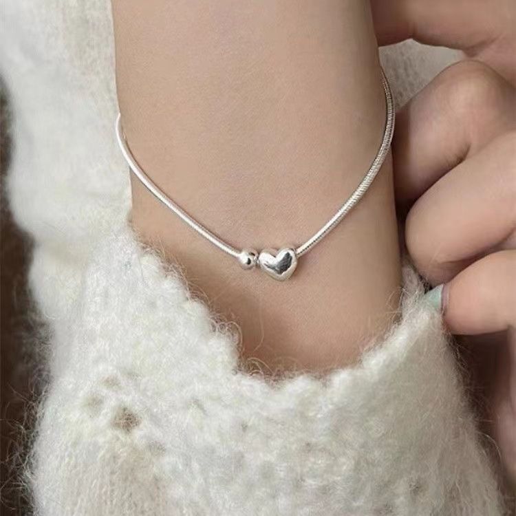 The new 925 sterling silver plated heart small silver bead bracelet niche design simple snake bone chain Korean hand ornament