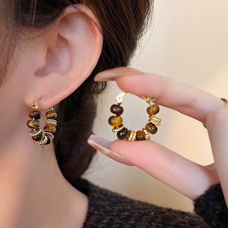 New style hot selling retro melad tiger eye stone earrings, lightweight beaded drop earrings, versatile ear studs and ear accessories for autumn and winter.