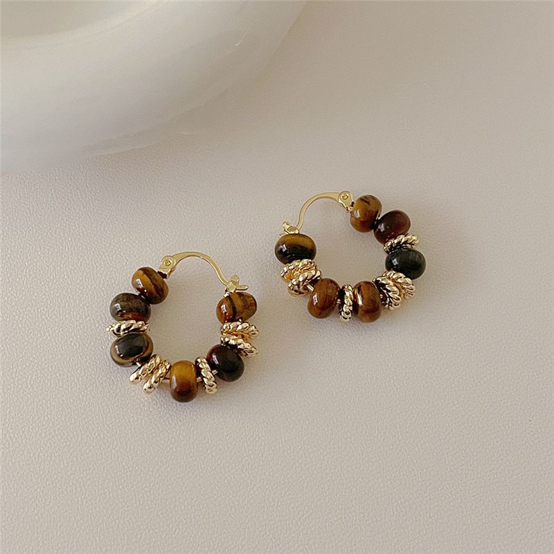 New style hot selling retro melad tiger eye stone earrings, lightweight beaded drop earrings, versatile ear studs and ear accessories for autumn and winter.