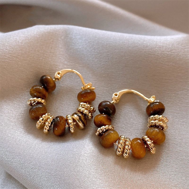 New style hot selling retro melad tiger eye stone earrings, lightweight beaded drop earrings, versatile ear studs and ear accessories for autumn and winter.