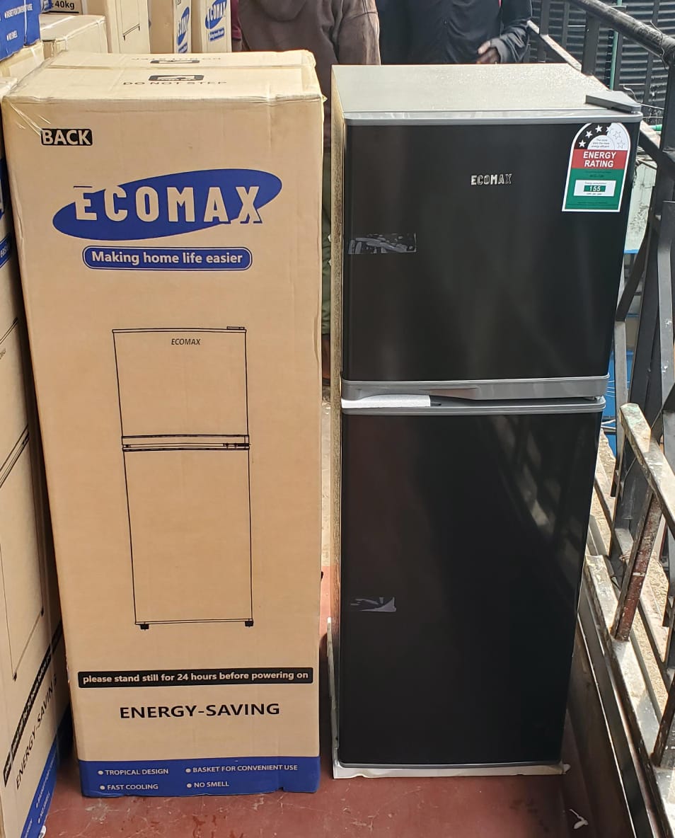 The Ecomax 138 L dark silver double-door refrigerator offers a sleek, compact design, separate freezer and fridge compartments, adjustable glass shelves, and a vegetable crisper.