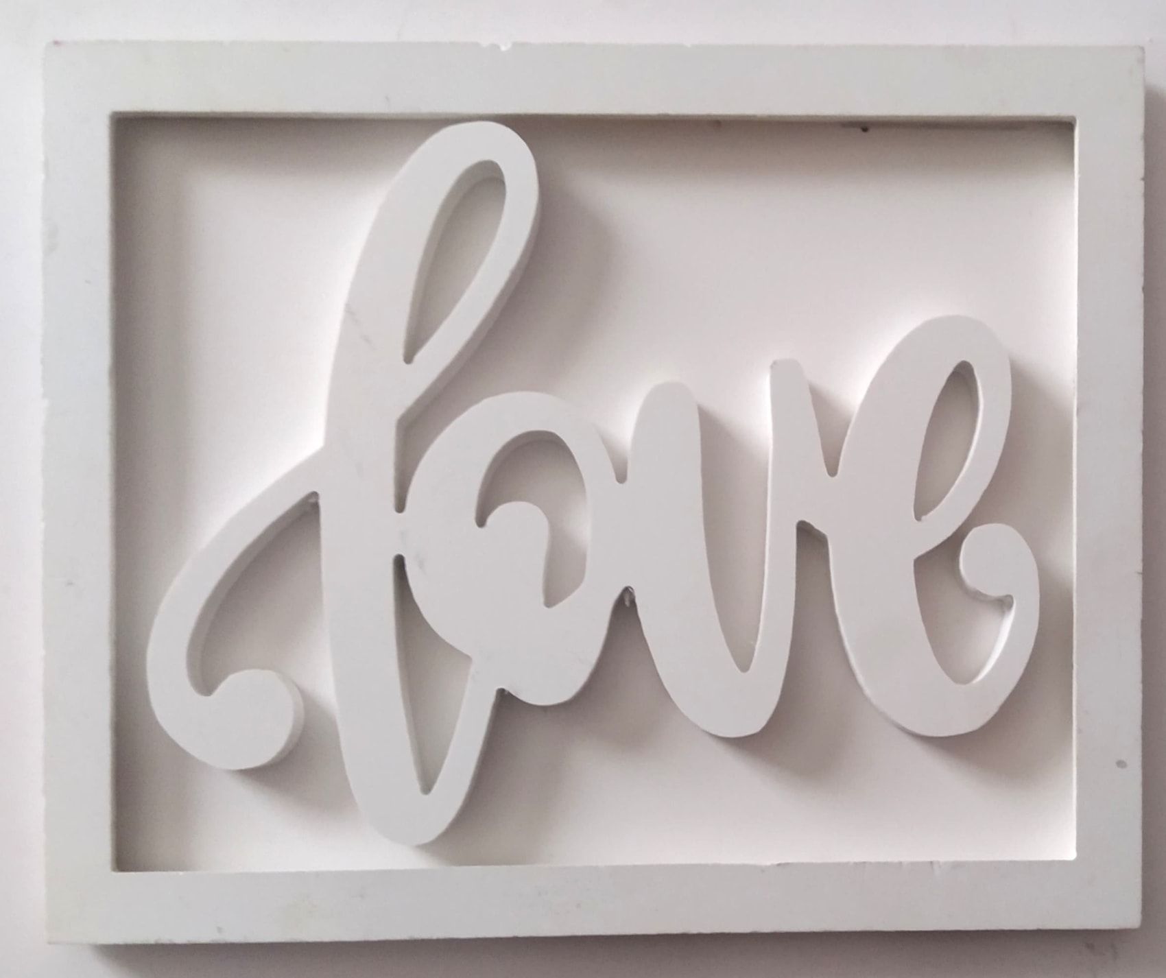 Framed 3d Wall Art Typography Love Framed 3D Wall Art Typography "LOVE" – A4 Size, Minimalist All-White Design Add elegance to your space with this A4 Framed 3D “LOVE” Wall Art. Minimalist all-white