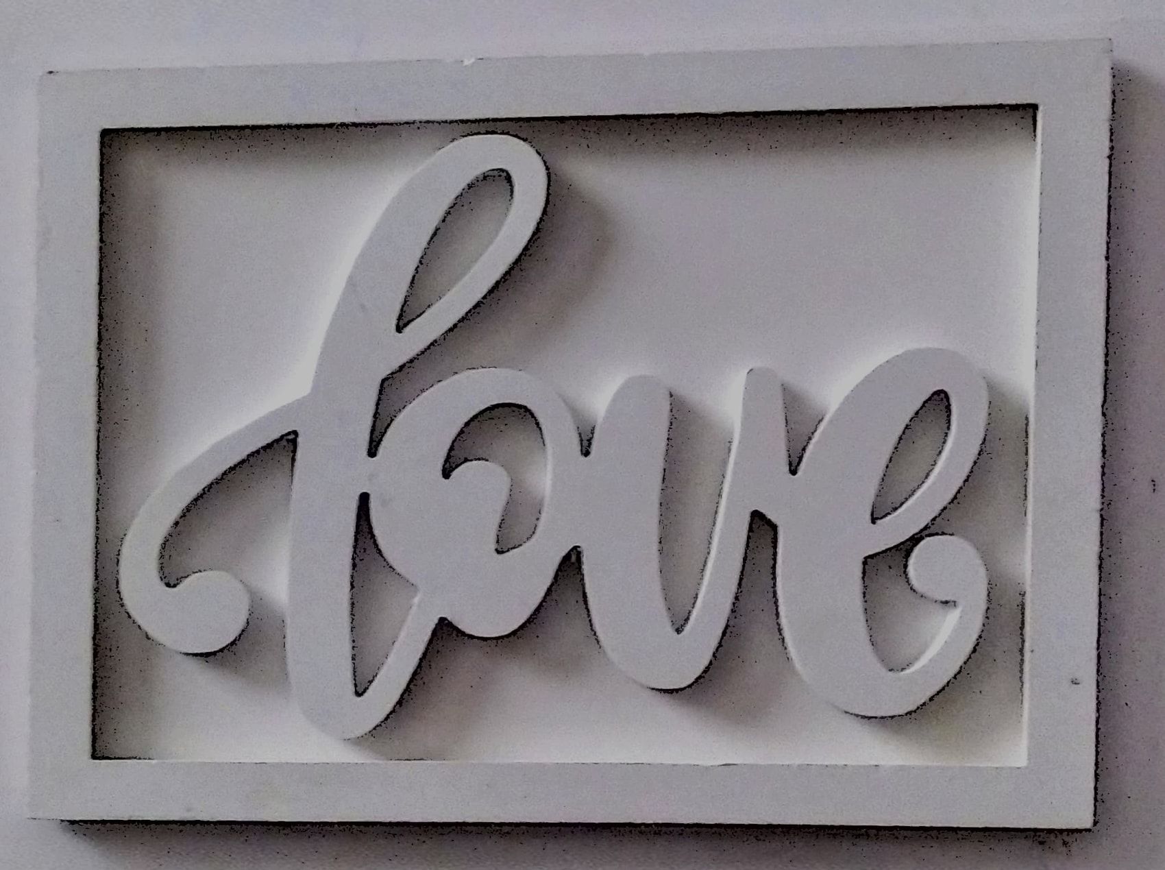 Framed 3d Wall Art Typography Love Framed 3D Wall Art Typography "LOVE" – A4 Size, Minimalist All-White Design Add elegance to your space with this A4 Framed 3D “LOVE” Wall Art. Minimalist all-white