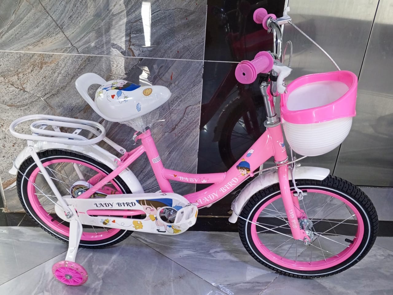 Lady Bird kids bikes Size 16(4 to 6yrs) with trainer Wheels