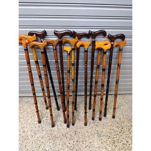 Wooden Walking Sticks for Seniors and Outdoor Use – Durable, Elegant & Comfortable Support Cane. Strong Wooden Build: Made from premium hardwood for durability and long-lasting use.

Ergonomic Grip: S