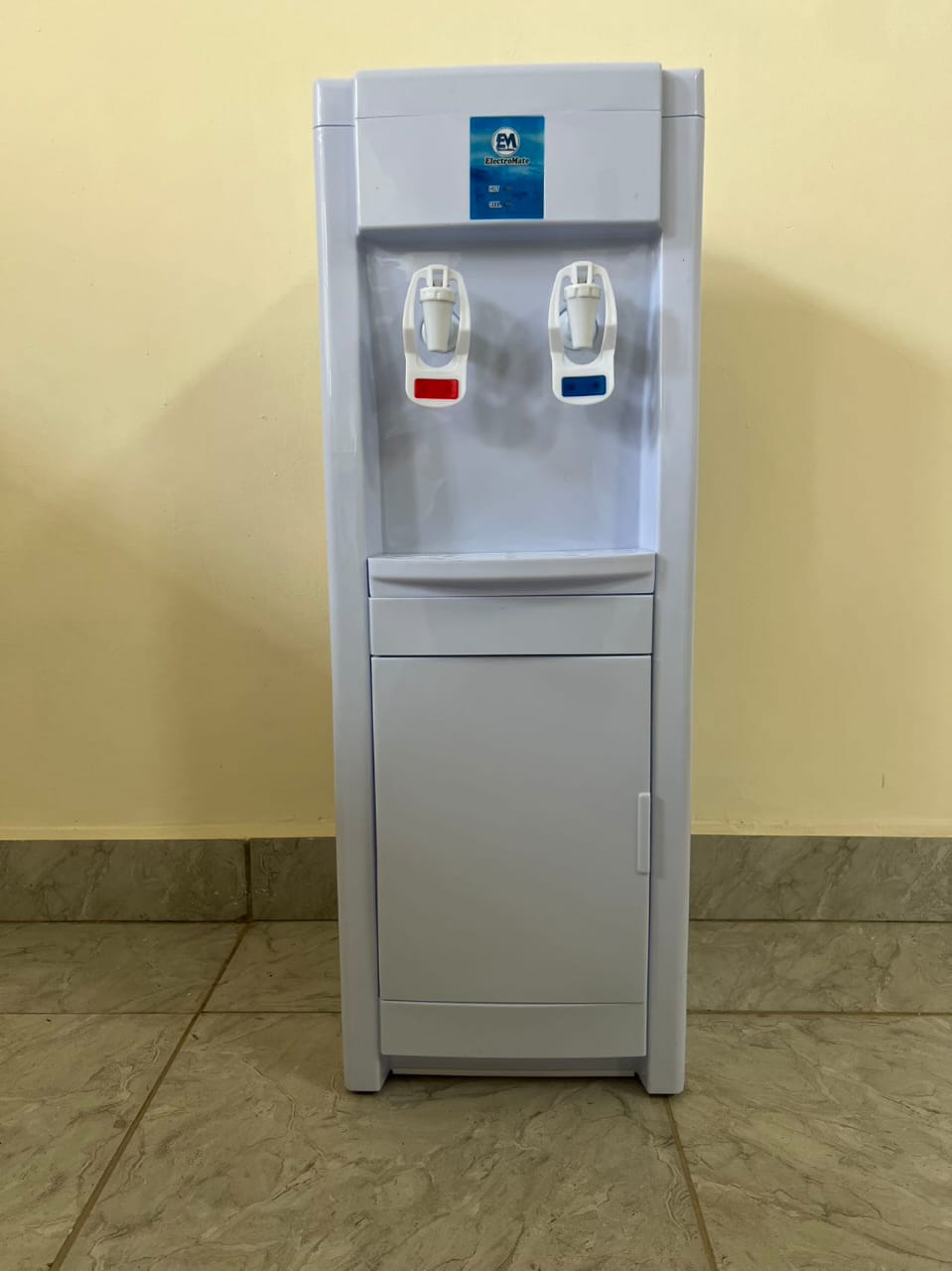WATER DISPENSER. Electromate dispenser hot and normal, features an anti-bacterial design that ensures the water stays clean and safe‎.Simple push-button operation for easy use. Sleek and durable