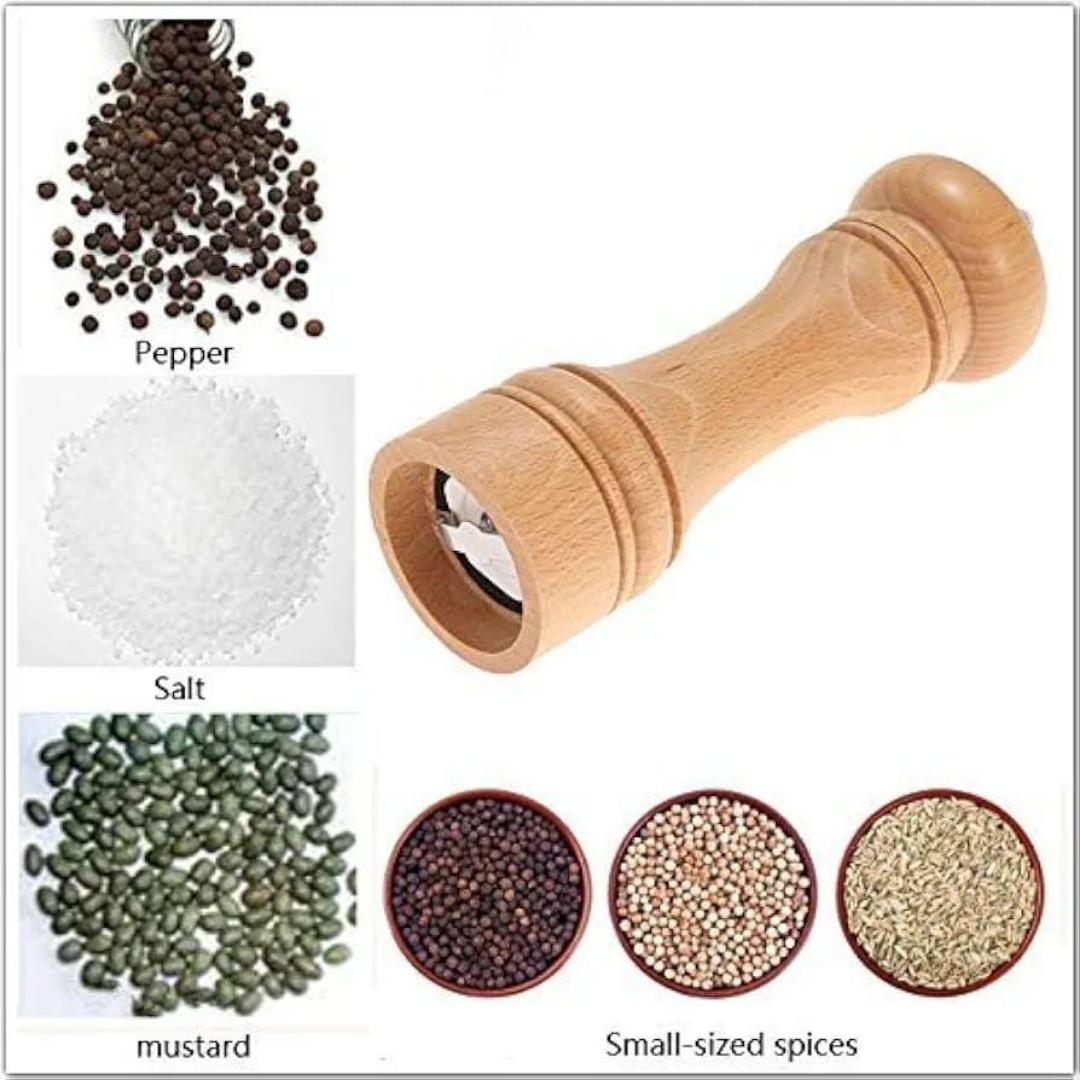 Pepper grinder small made of wood Measures 5.5inchs. Unique and classy