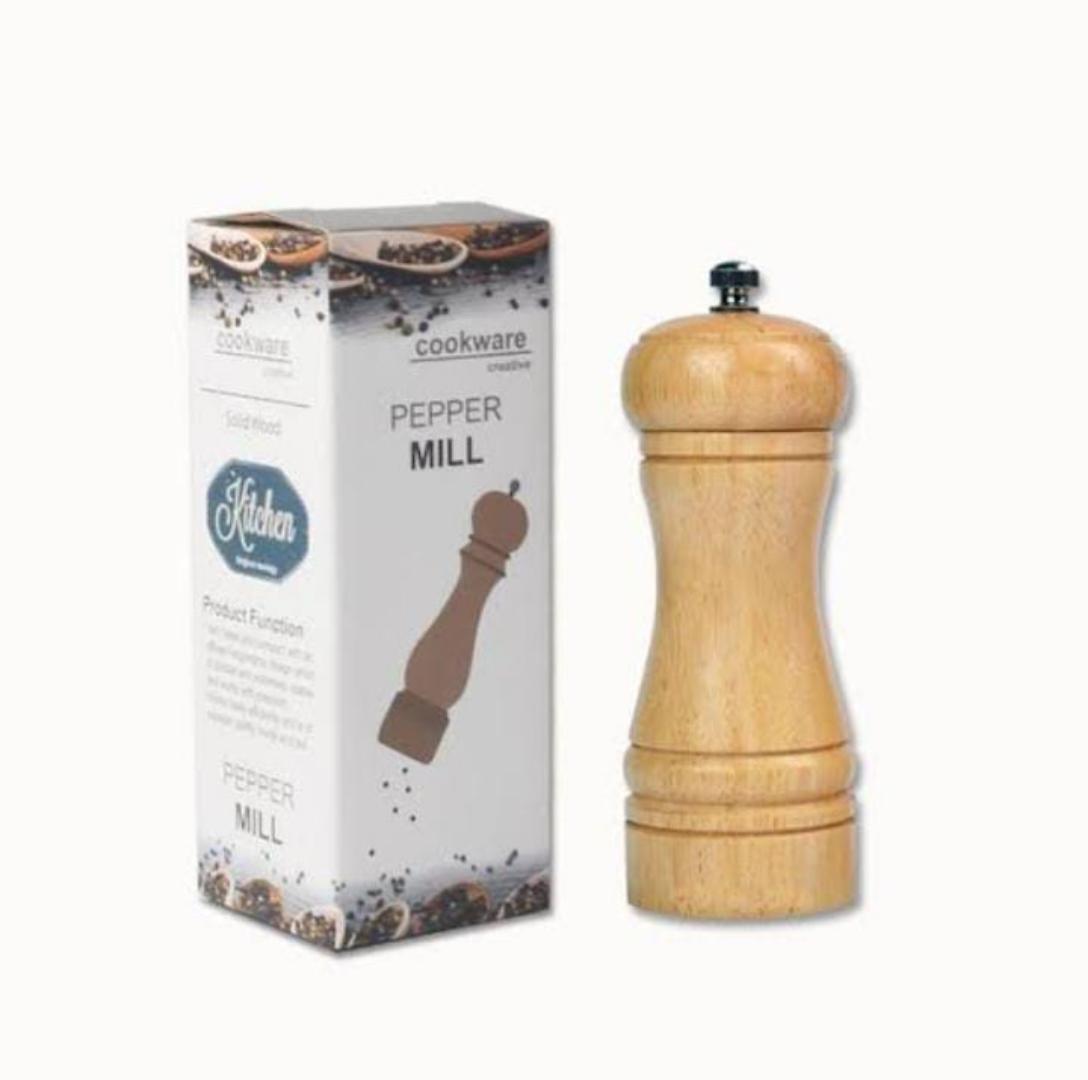 Pepper grinder small made of wood Measures 5.5inchs. Unique and classy